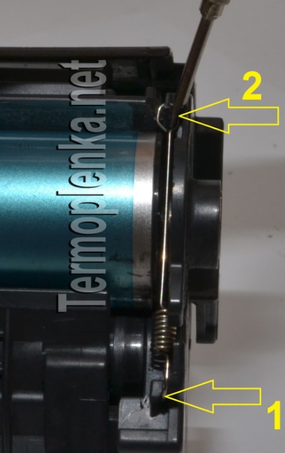 Установите пружину 2