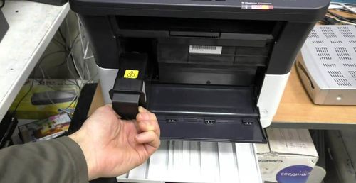 Замена картриджа с тонером