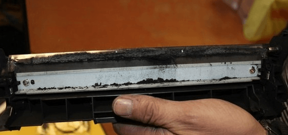 скопление тонера на ракеле