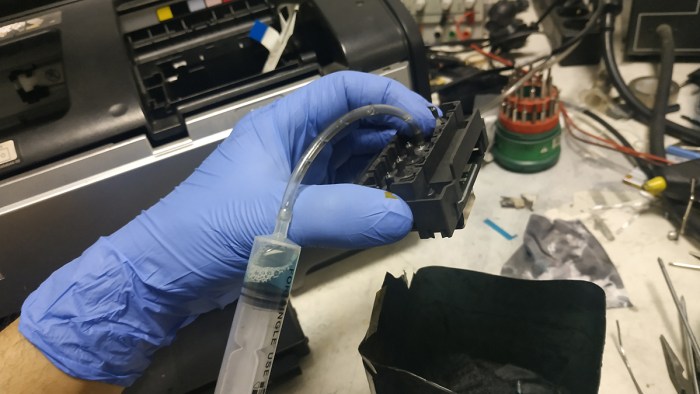 Процесс промывки печатающей головки Epson 1410